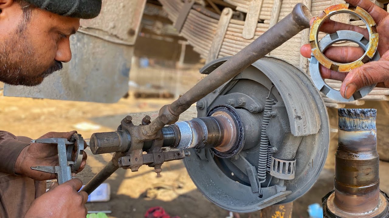 1967 old Bedford truck damage thread of the rear axle spindle how cutting thread with handmade