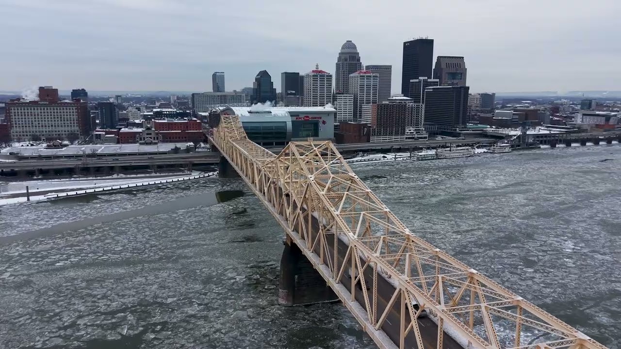 Aerial views of the Louisville, Kentucky skyline and the icy waters of the Ohio River!