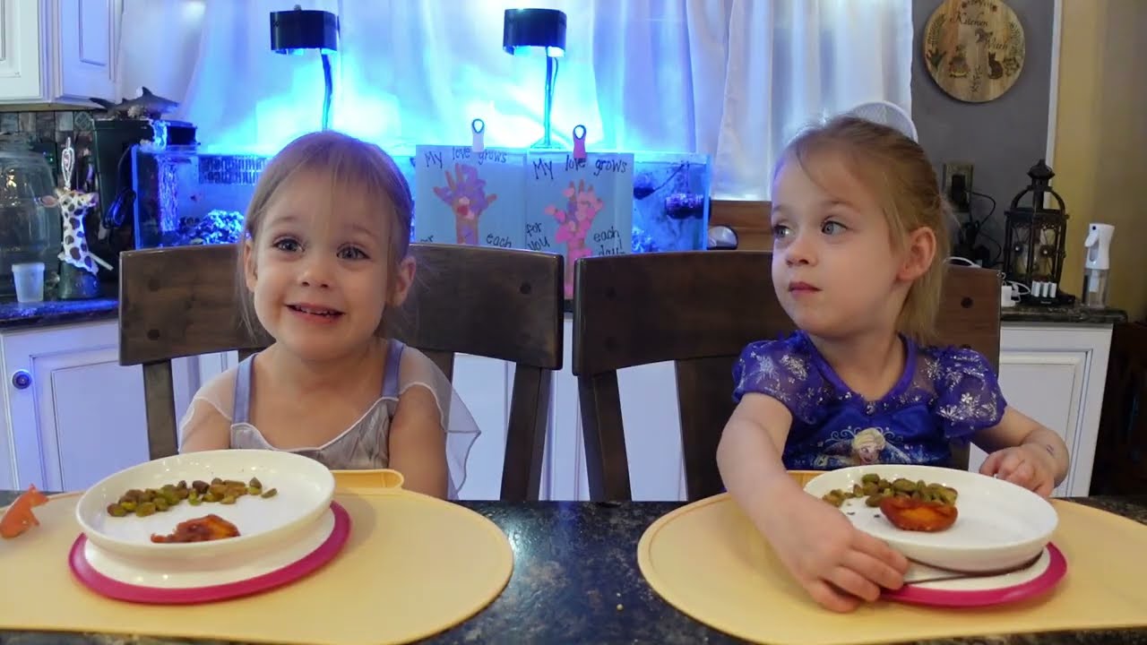 Twins try dehydrated peaches