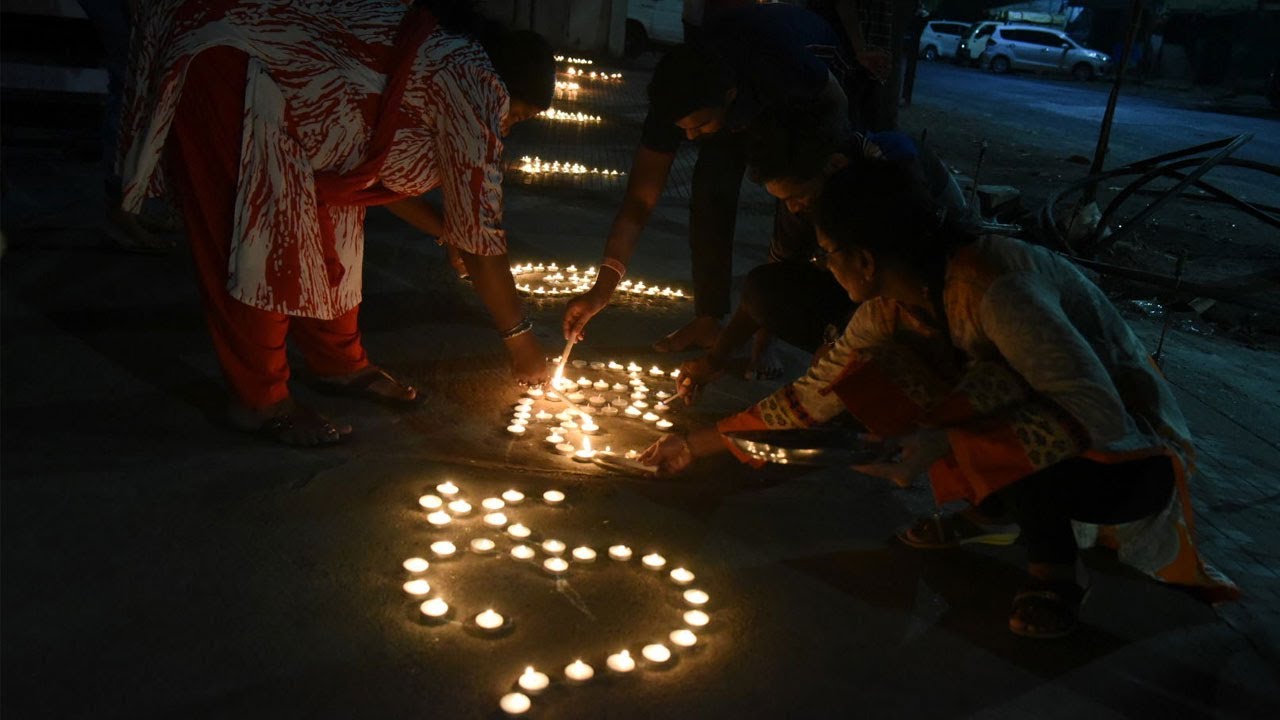 Millions respond to PM Modi's appeal; people light candles, diyas to mark fight against COVID-19