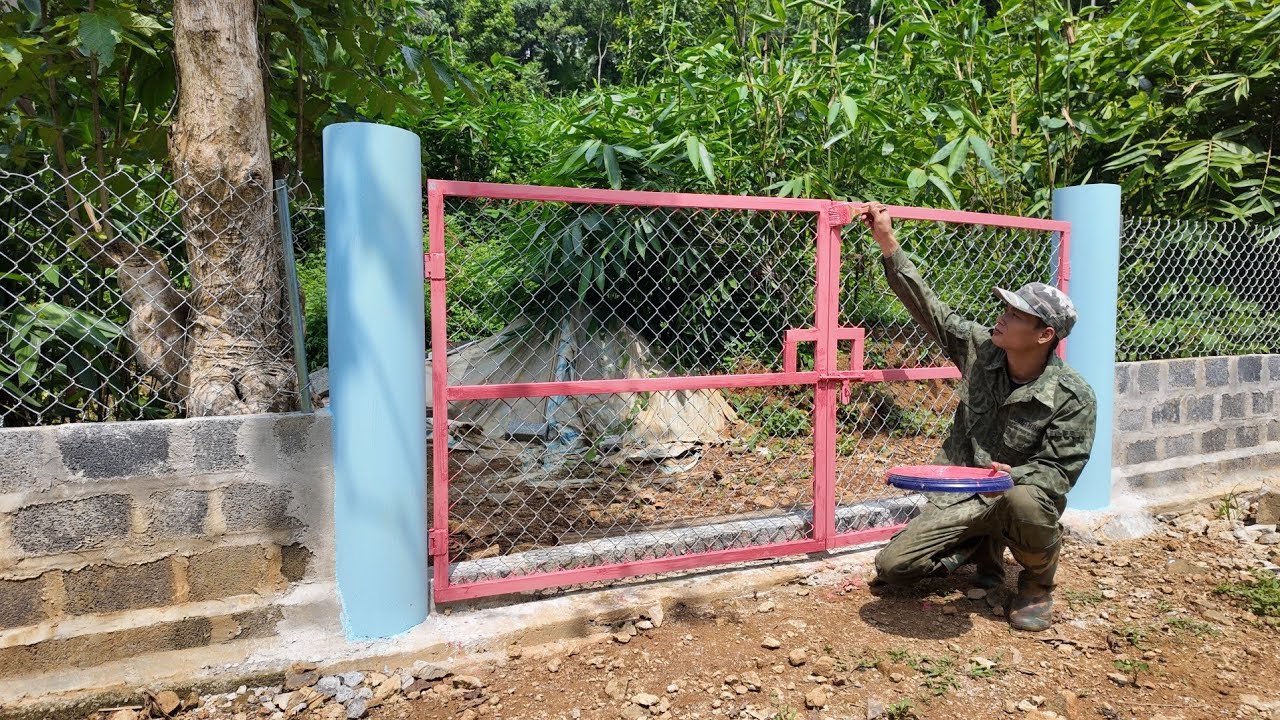 Build a beautiful gate on a farm deep in the wild mountains