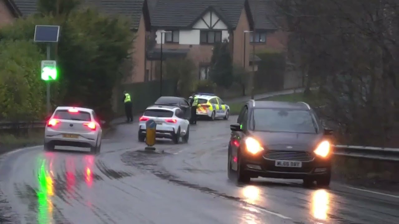 Police Focus bust Mondeo Man, Escort off the A91