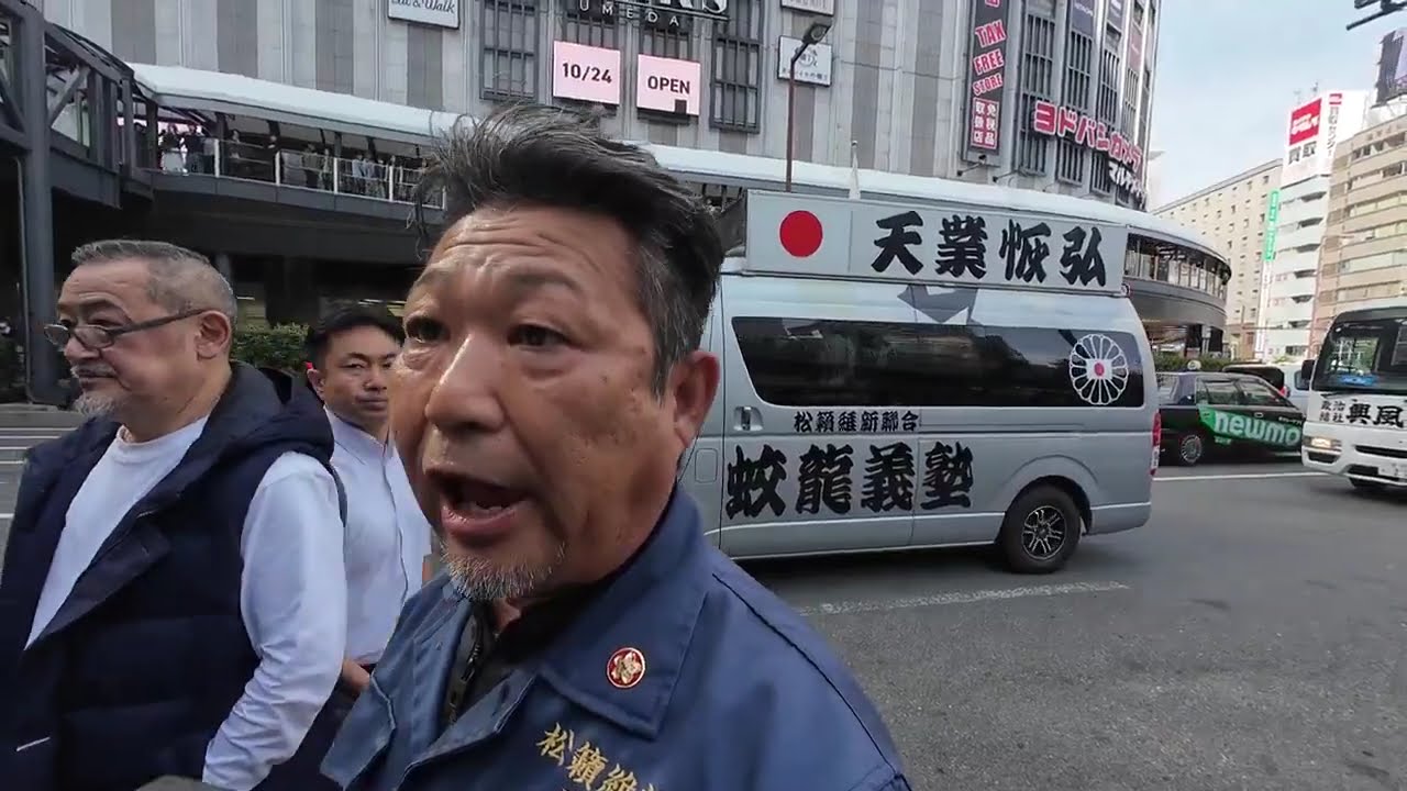 しばき隊の難波君、街宣右翼に囲まれるの巻。