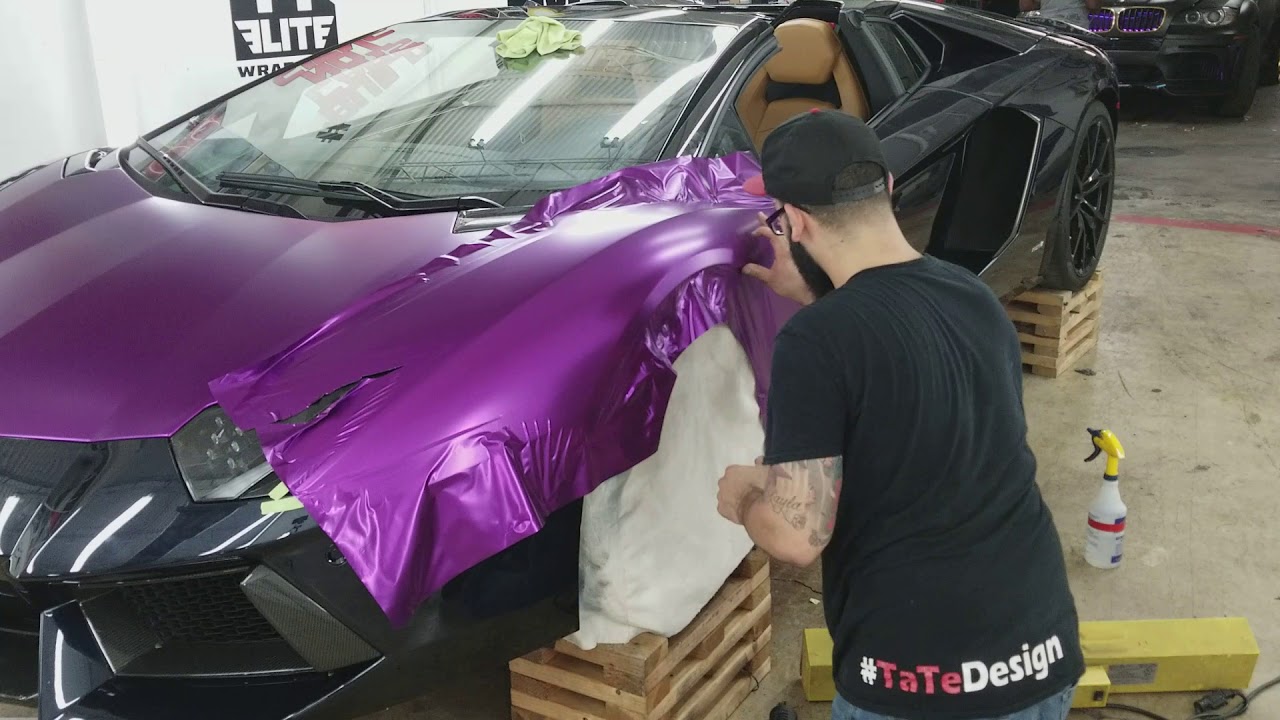 Time lapse of wrapping satin purple chrome lamborghini aventador