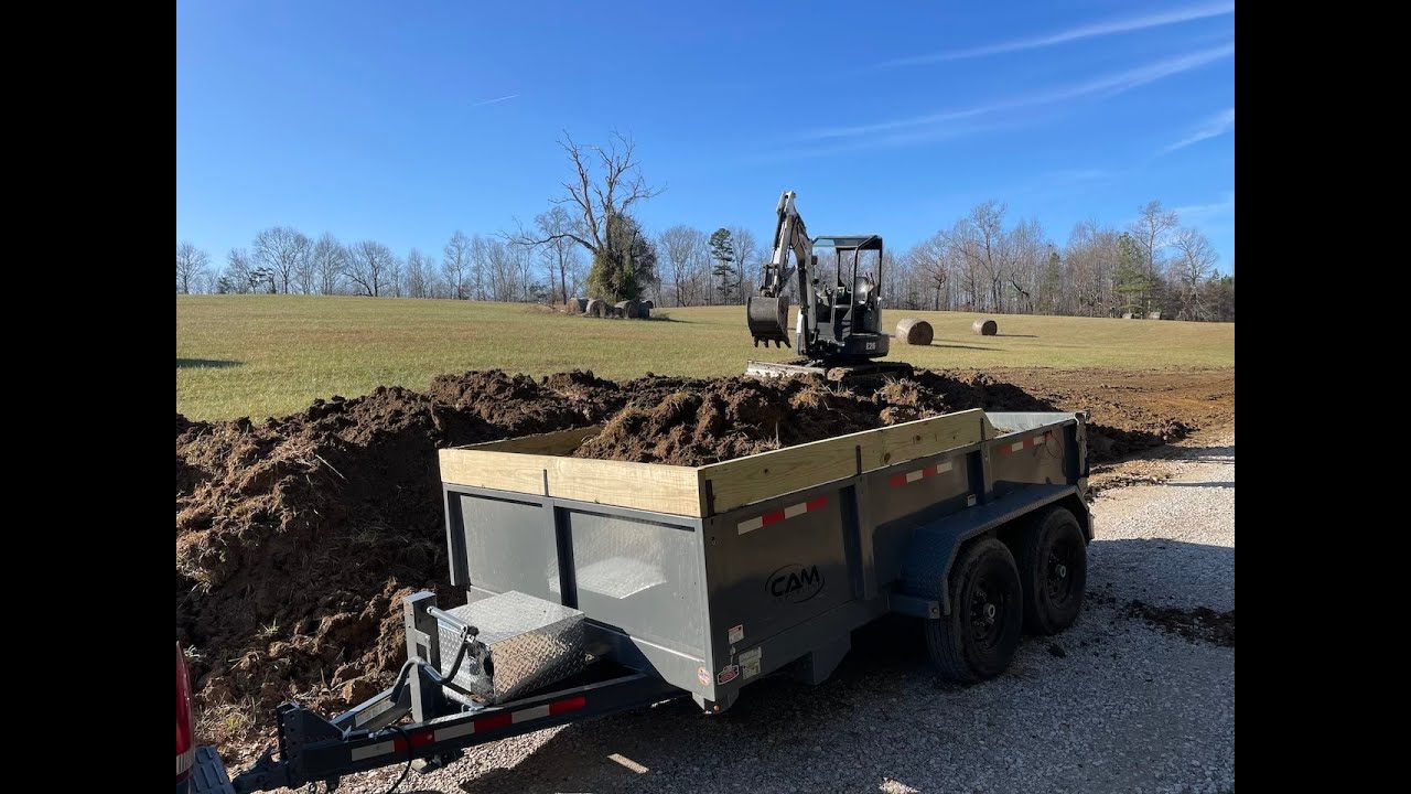 Hauling dirt with the new Cam dump trailer