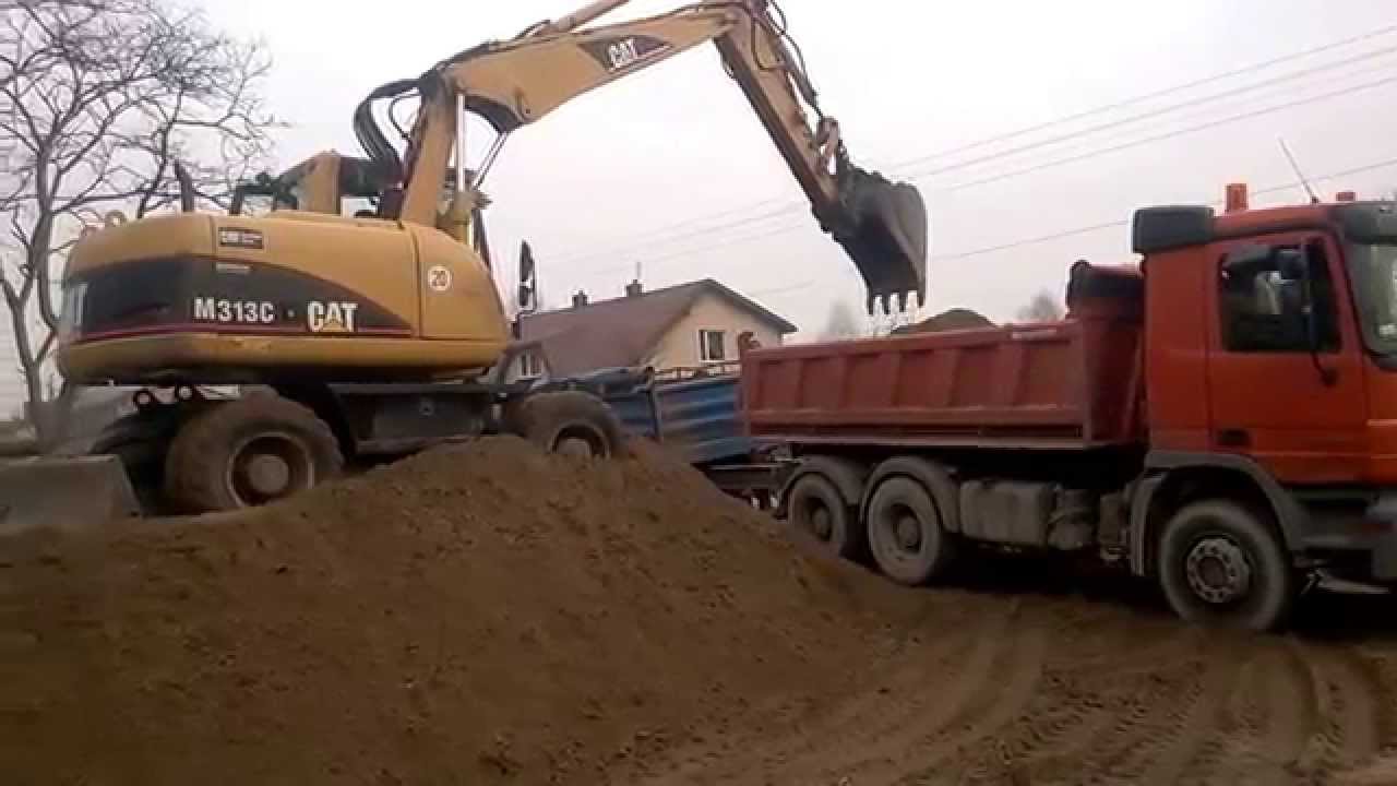 Koparka CAT 313C załadunek operator Kondzio