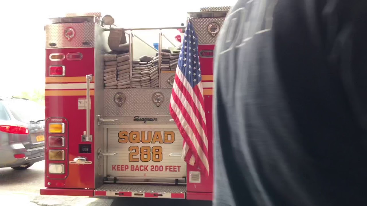 FDNY SQUAD 288 RESPONDING FROM QUARTERS ON 68TH STREET IN MASPETH AREA OF QUEENS IN NEW YORK CITY.