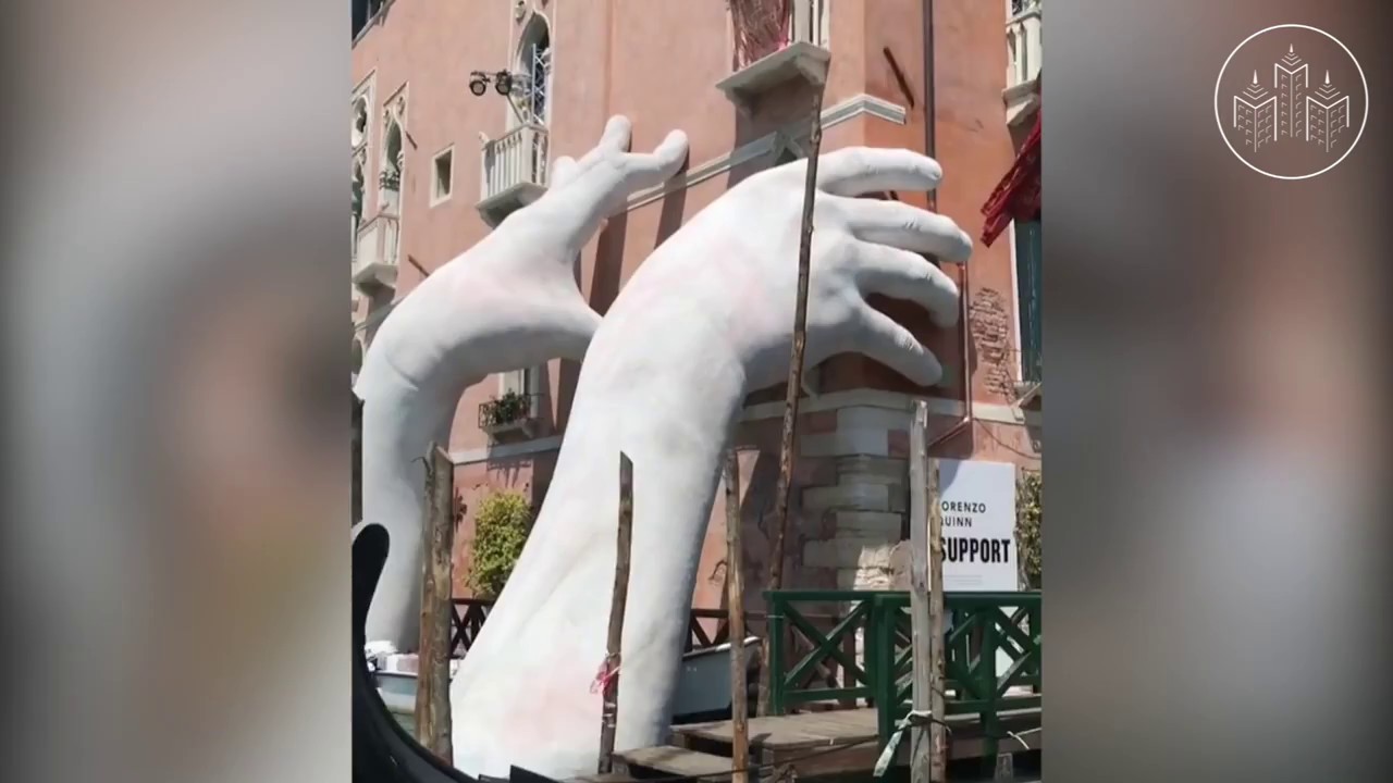 Two Giant Hand Sculptures Emerge in Venice