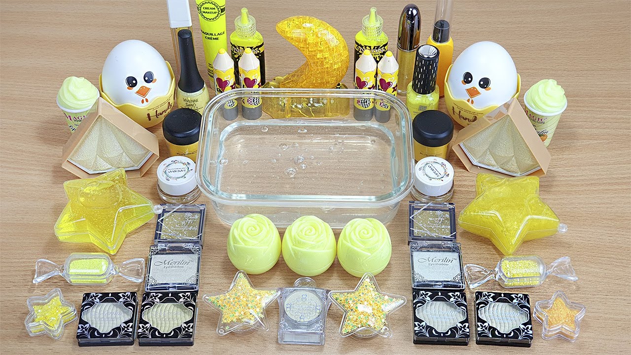YELLOW SLIME Mixing makeup and glitter into Clear Slime Satisfying Slime Videos