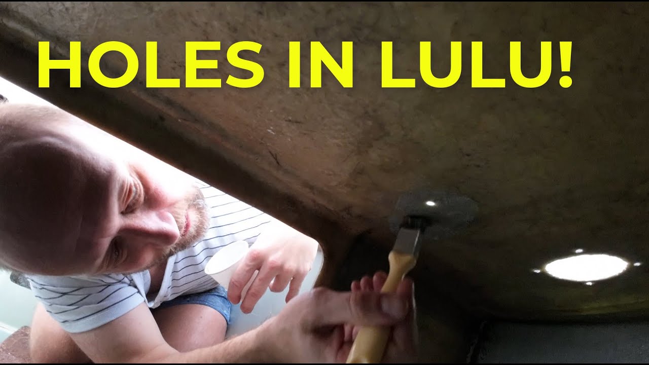 Fibreglassing holes in my Drascombe Lugger Lulu in the Winter!