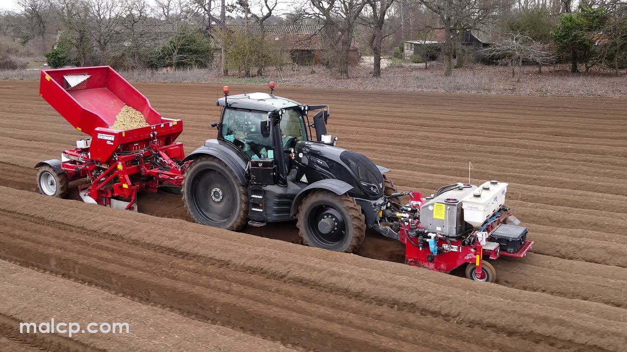 4k Massey Ferguson, Valtra and JD tractors planting potatoes with Foskett Farms in Kirton, Suffolk.