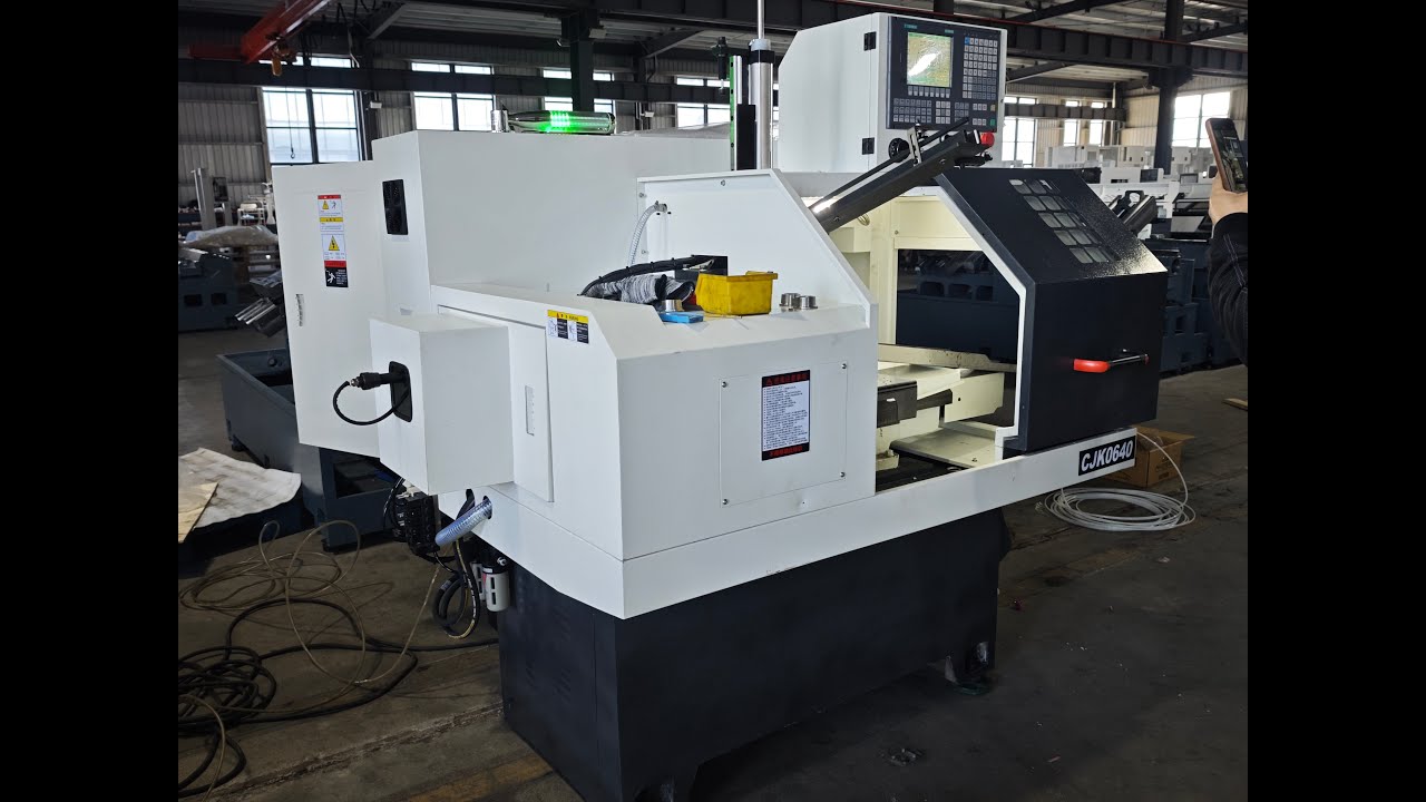 Small CNC machine with front automatic feeding which process SS material easily