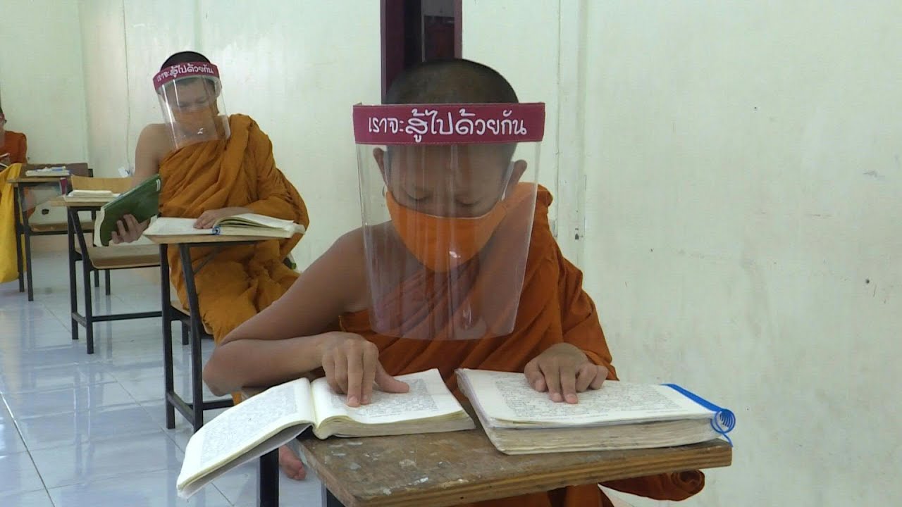 Novice monks in Thailand given faceshields during study | AFP
