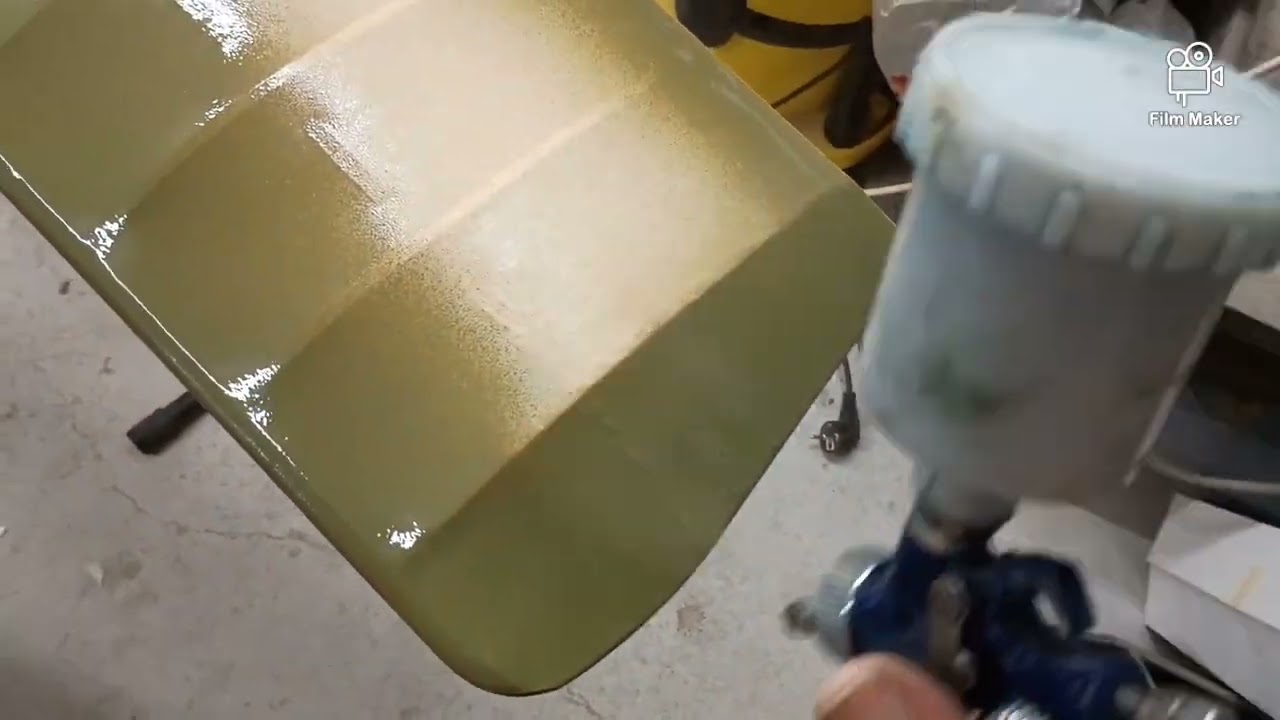 Spray painting a model airplane with outdoor latex paint 