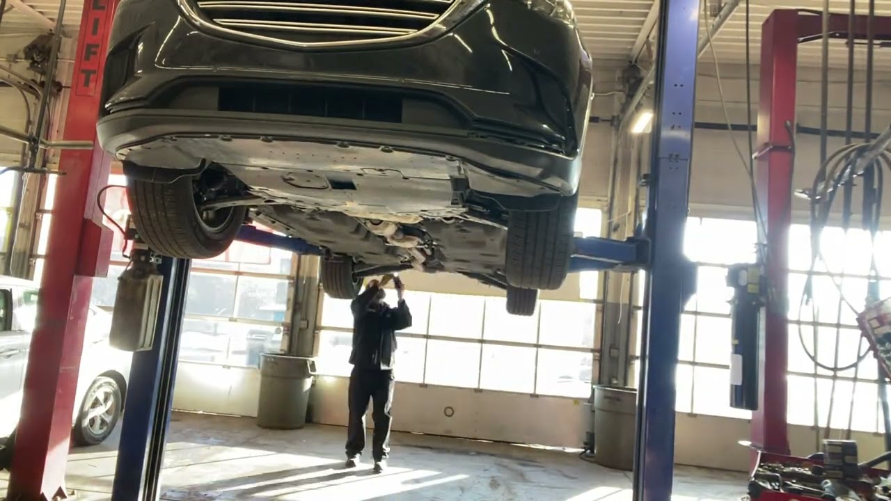 Inspection and oil change for a 2021 Mazda CX-9 at 100X speed. 