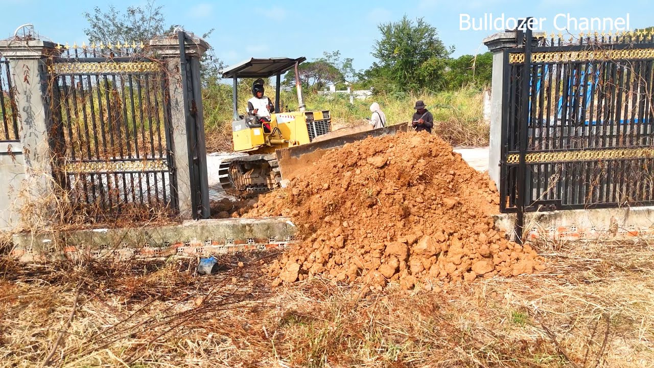 Starting New Project Landfill With Komatsu D20P Dozer Pushing Dirt And 5 Ton Truck Unloading Dirt