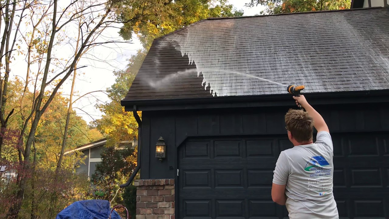 Roof Wash I'm using a garden hose sprayer with a booster pump.
