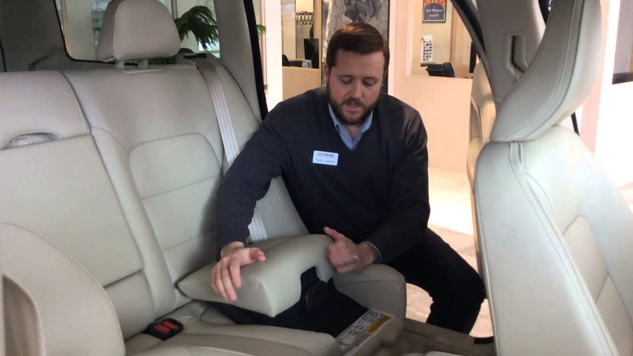 Ricky Lovering demonstrates Volvo's booster seats