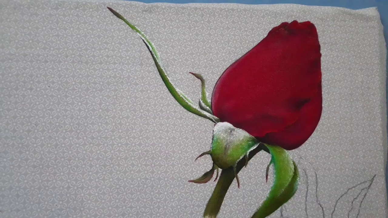 Botão de rosa vermelho pintado em tecido