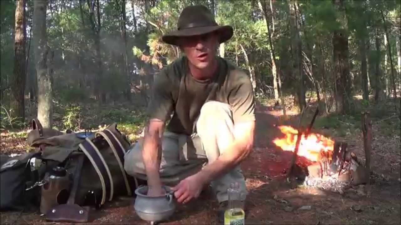 Seasoning A Cast Iron Pot Over Fire