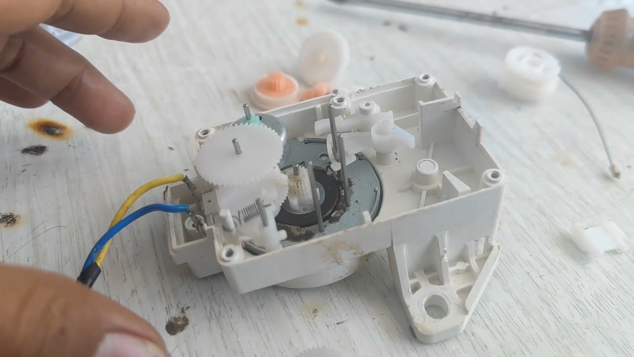 bongkar pasang motor drain mesin cuci