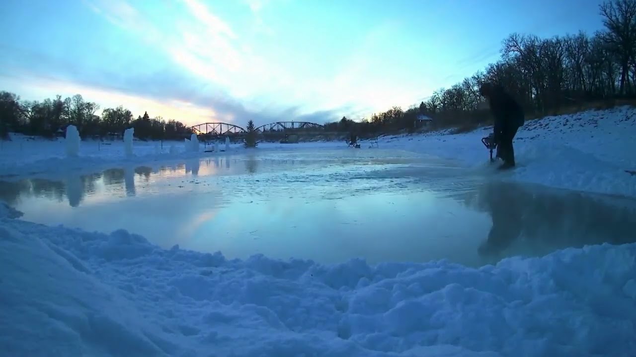 Flooding River Skating Rink With Ice Auger