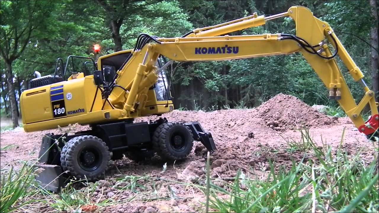 Fumotec Komatsu PW180-10 erster Einsatz nach der Enthüllung auf der Minibaustelle