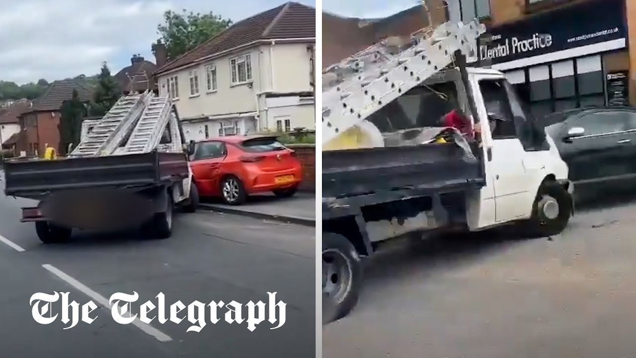 Swerving truck mounts pavement and hits multiple cars as suspected drink-driver arrested