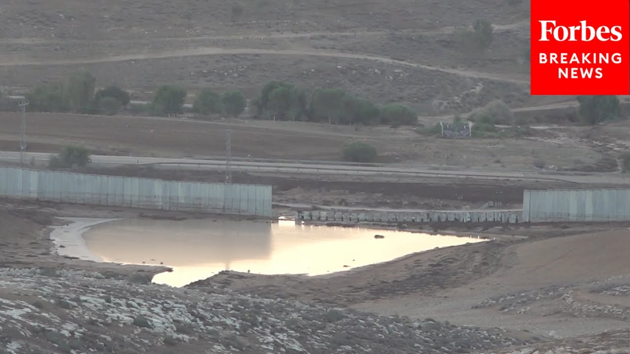 Heavy Rainfall Causes Section Of Israel's Separation Wall In The West Bank To Collapse