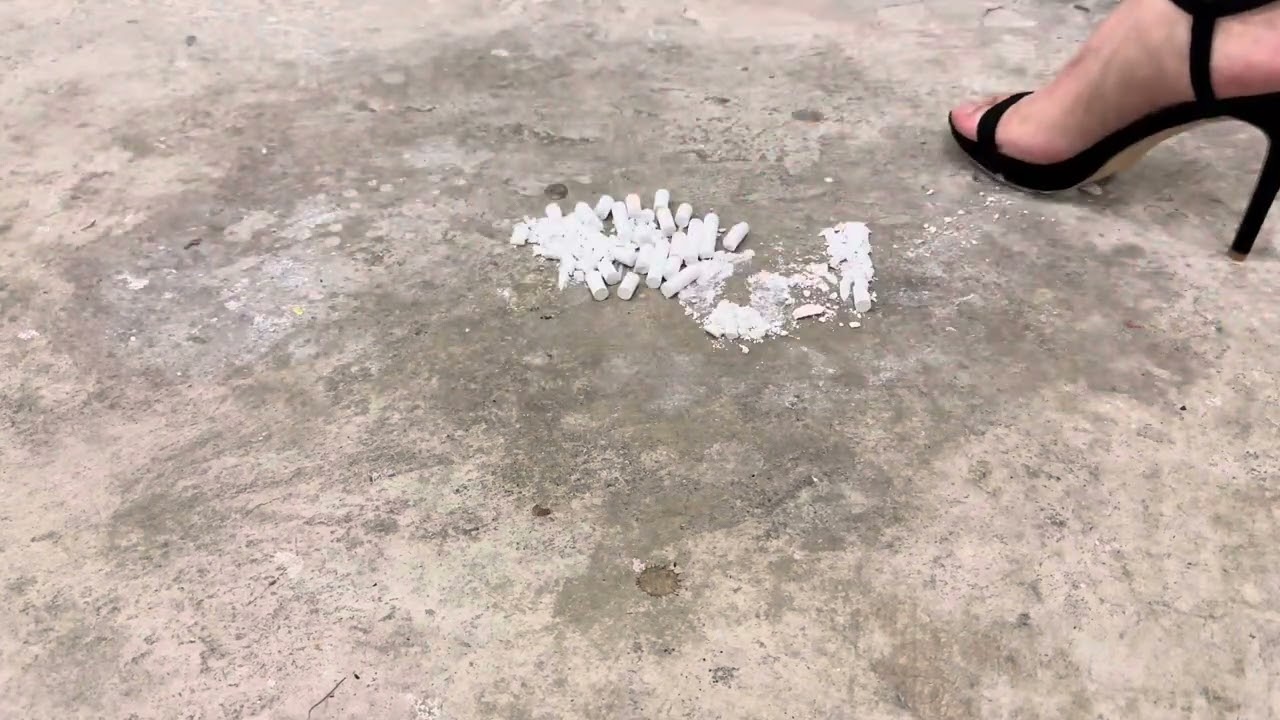 I try to walkover and crush the chalk with those 11 cm black platform sandals