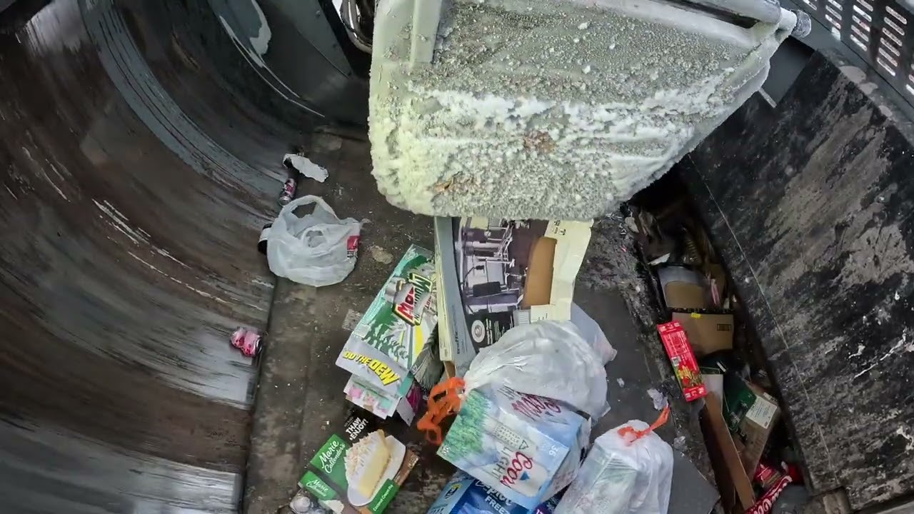 Garbage truck hopper POV: McNeilus ZR Smashing recycling!
