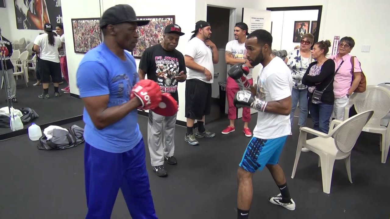 Floyd Mayweather Sr. padwork with Mickey Bey inside Mayweather Boxing Club