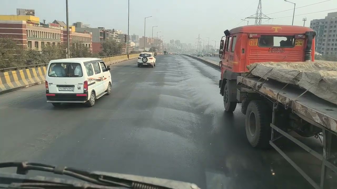 India Gujarat Ahmedabad city Ring Road traffic problem over bridge new