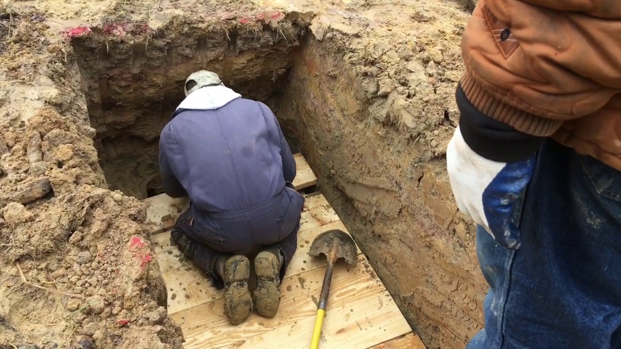 Digging a Muslim grave for a burial. Amazing! Interesting and Funny workers. Watch and see!