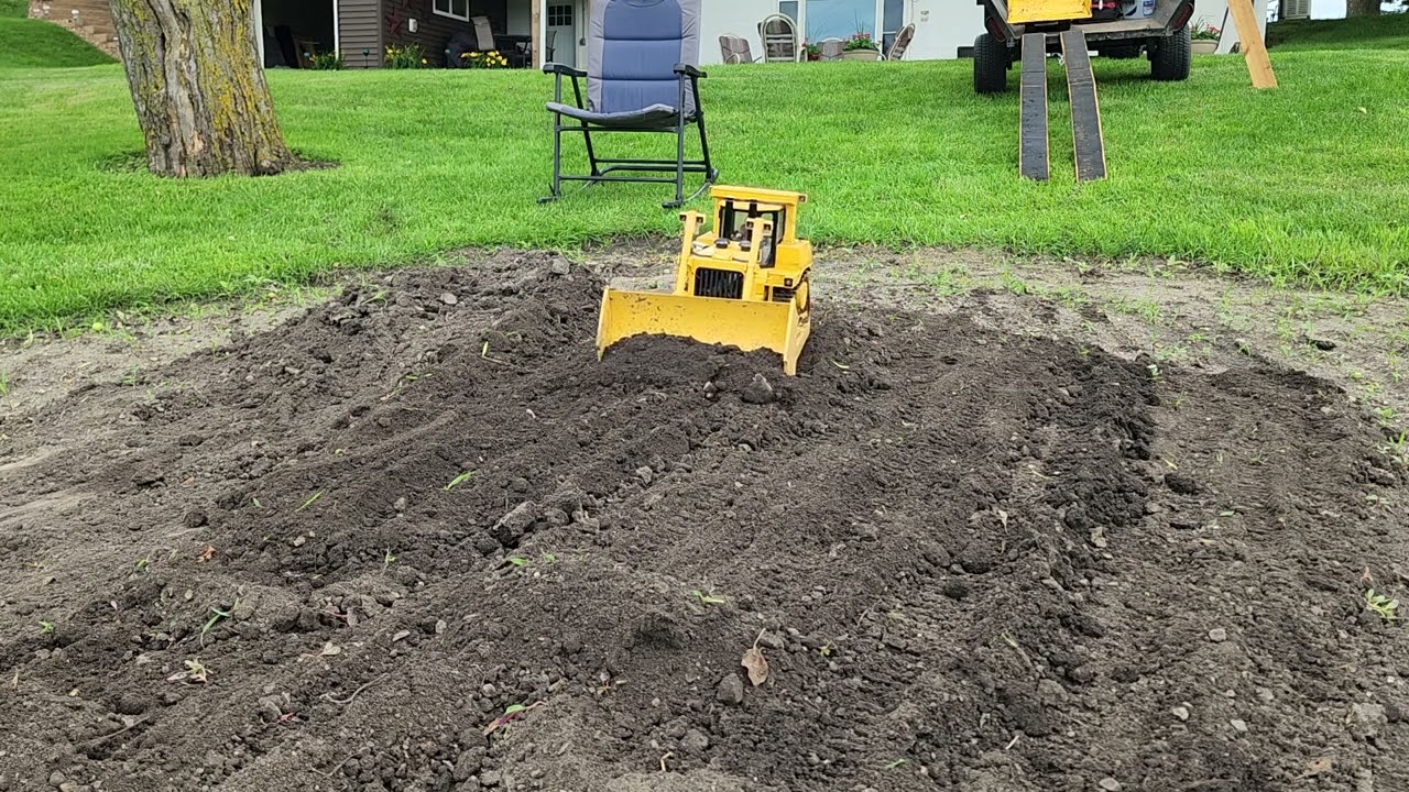 DXR2 Dozer leveling a mound