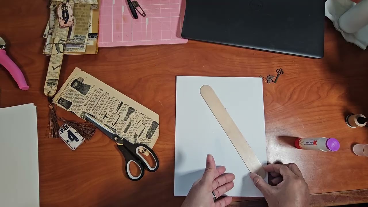 Creating book marks out of tongue compressors for junk journals 