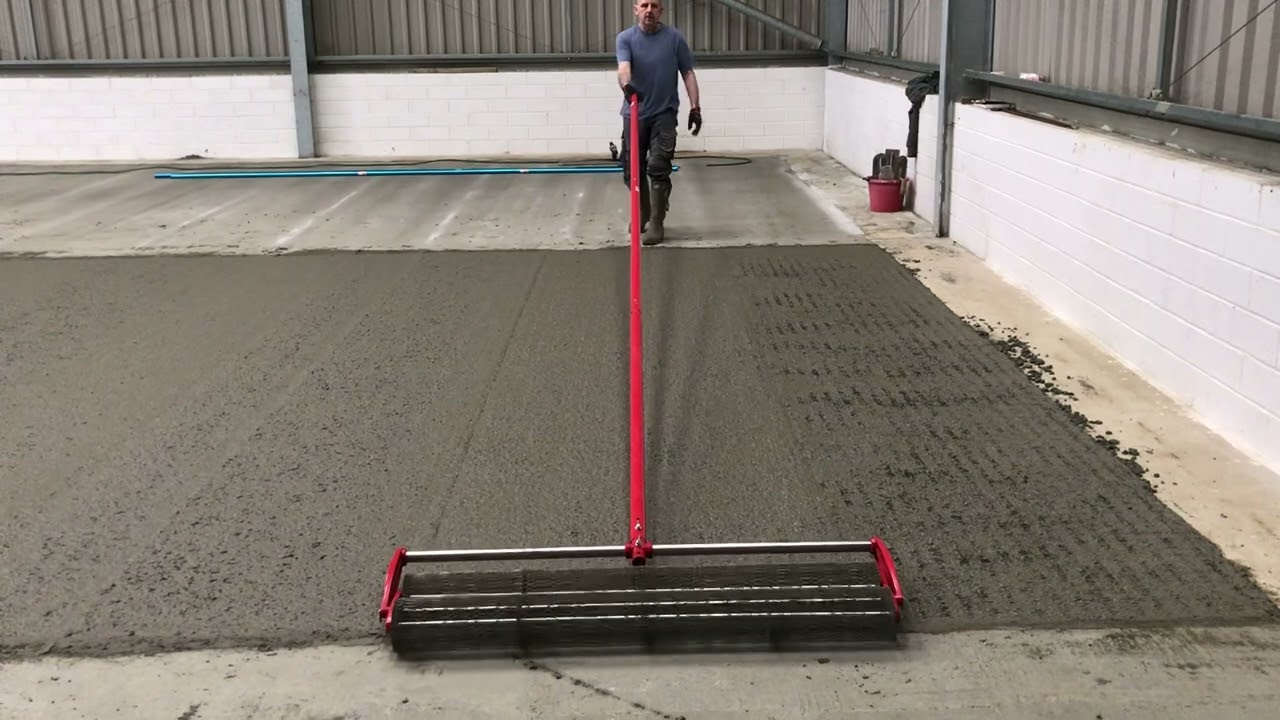 Concrete tamper roller