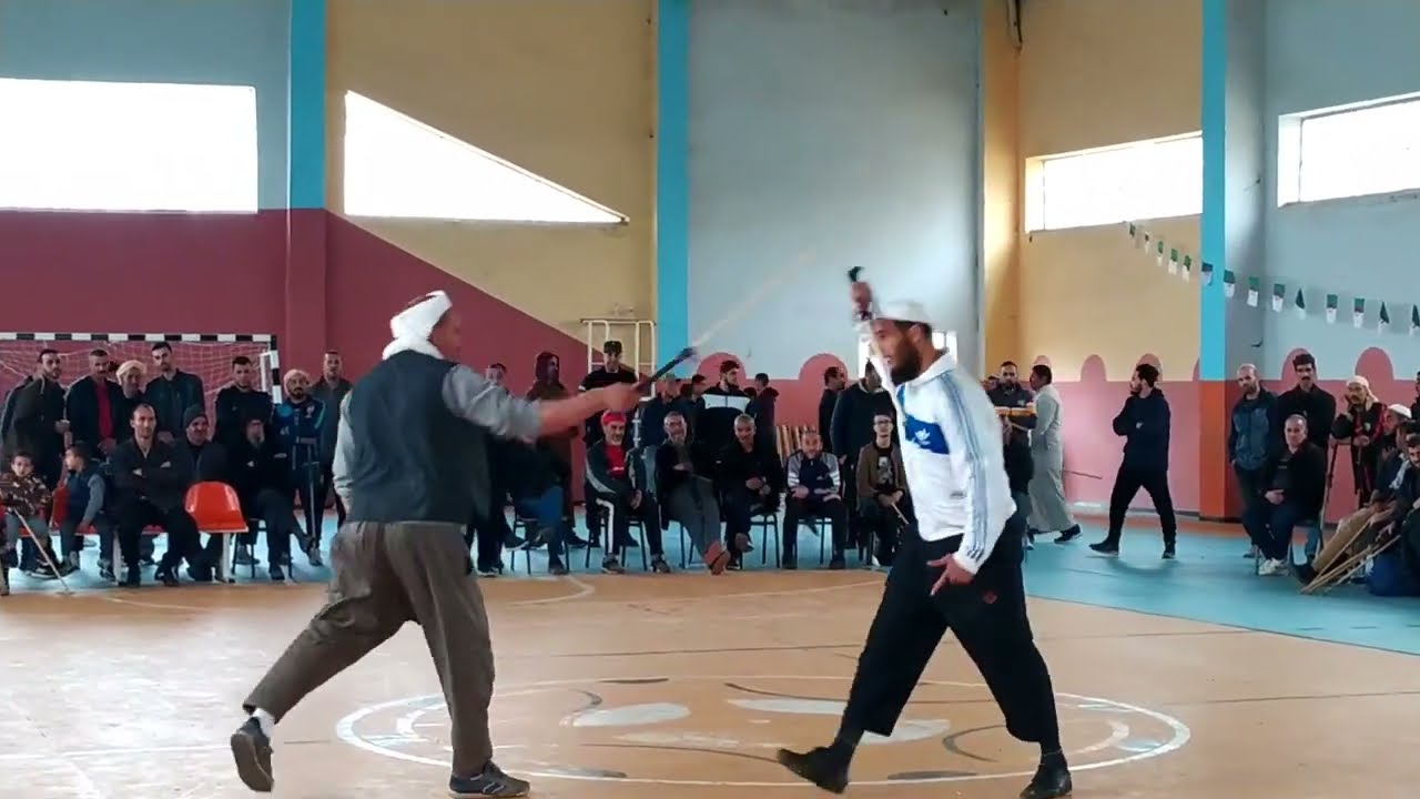 رياضة العصى التقليدية مع الشيخ محمد المدعو الروجي قصر البخاري ڨندوز الشيخ أمحمد نتاع تيارت