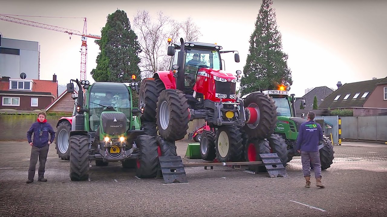 STUNT: MF tractor drives over other tractors - Abemec