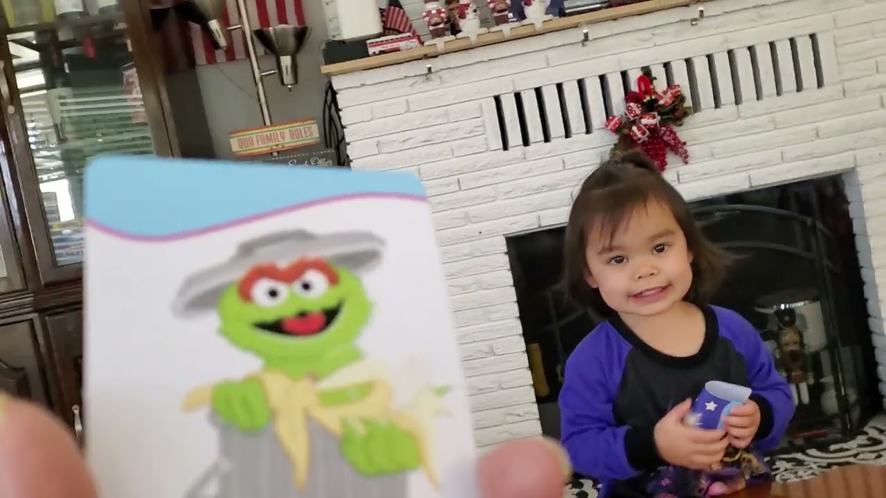 Baby Leah learning her activity cards