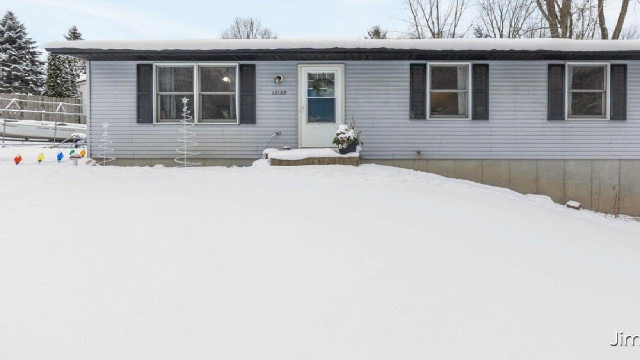 12189 Reyburn Drive NE, Sparta, MI Presented by Jim Connell.