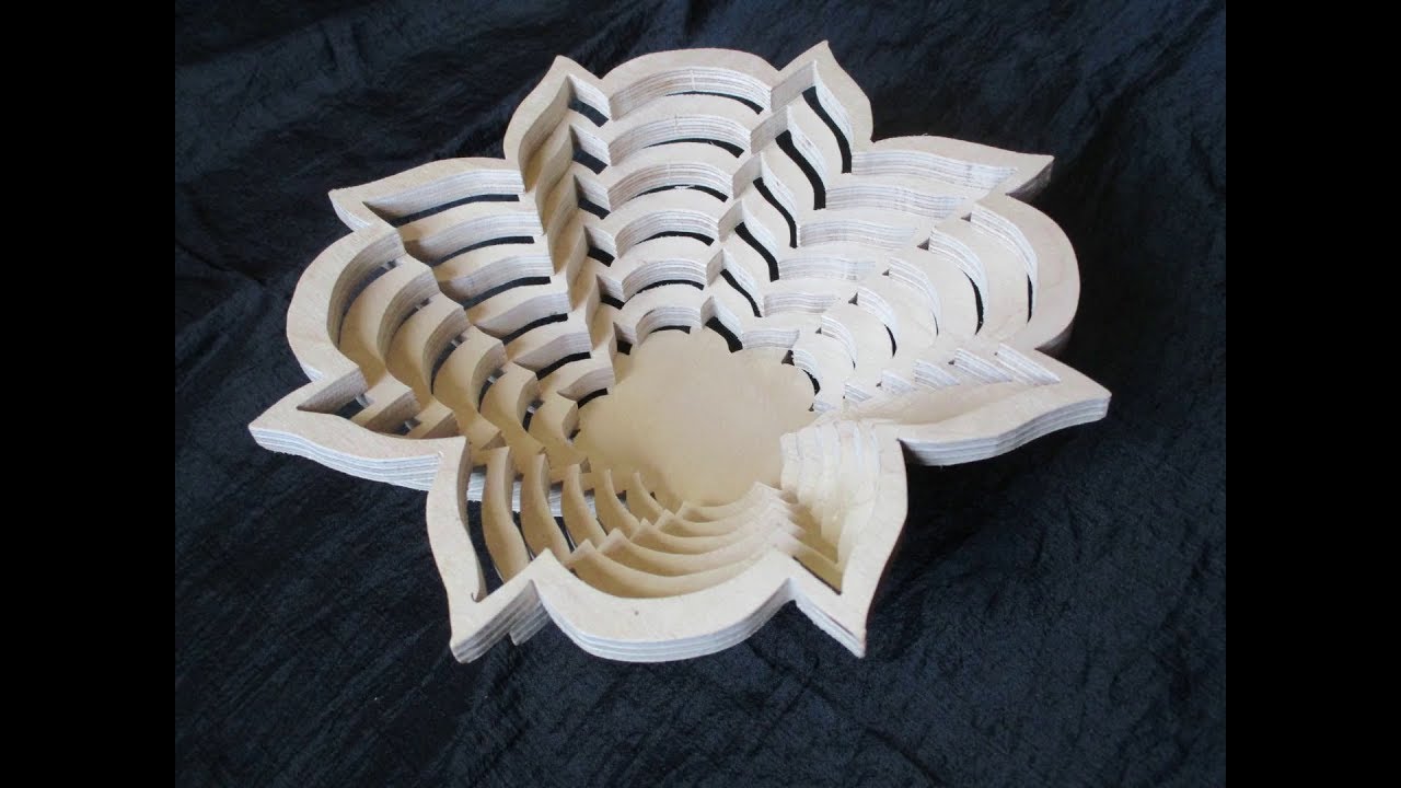 Sawing a basket on a scroll saw.