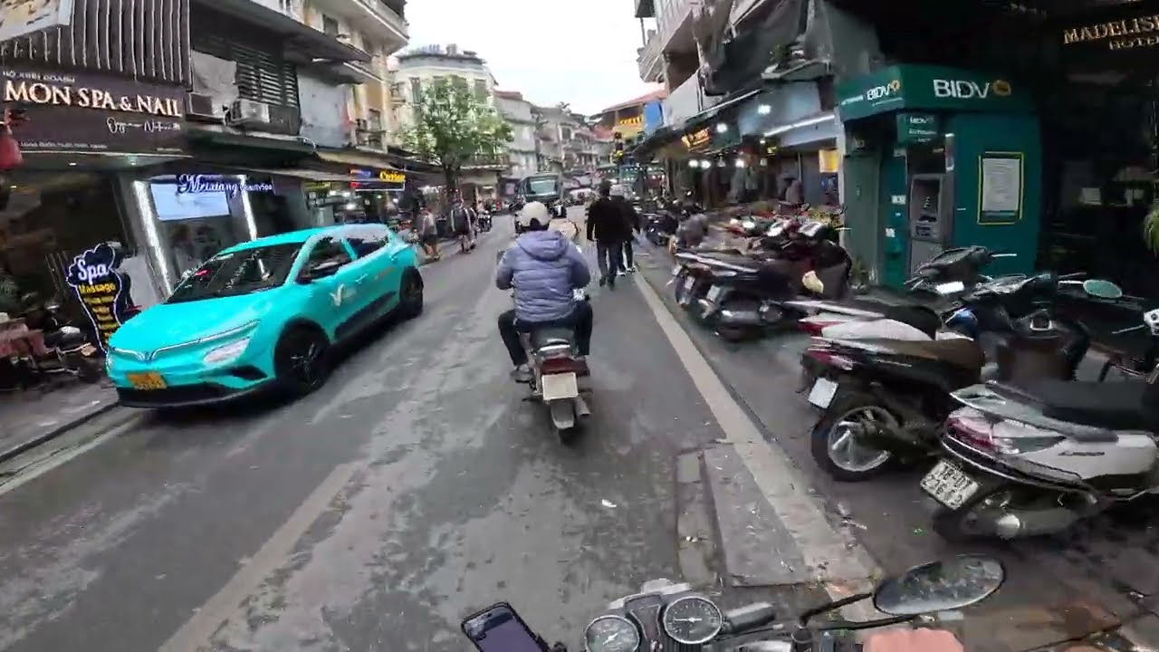Motorbiking the chaotic streets of Hanoi, Vietnam
