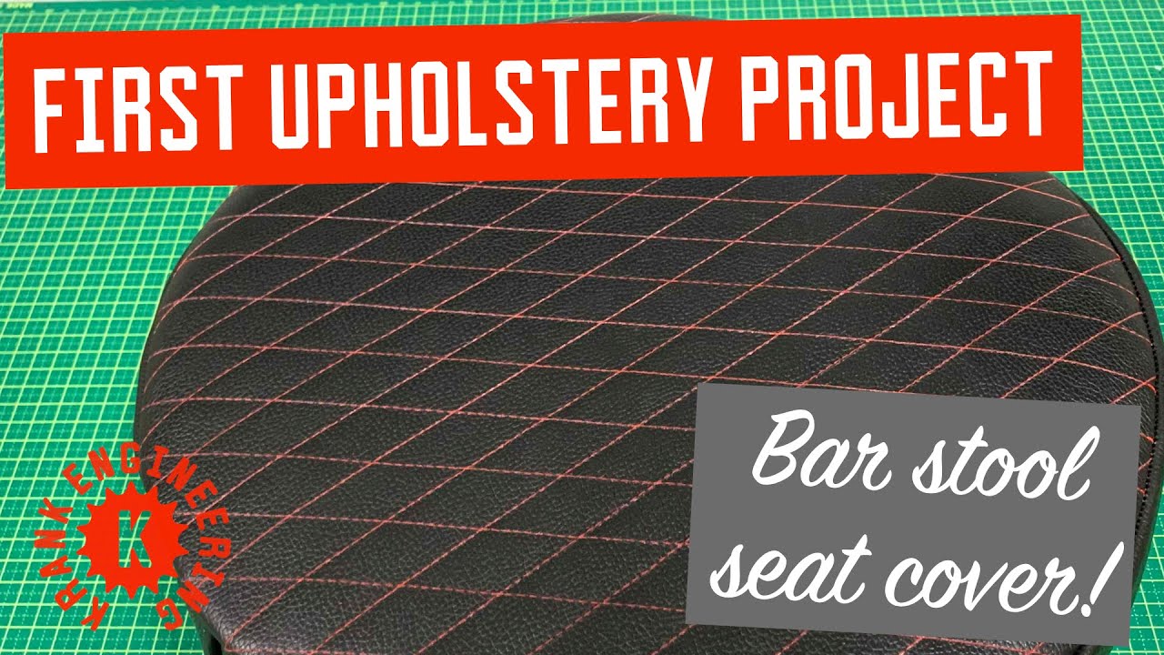 DIY metal industrial-style bar or shop stool with a leather diamond stitched cover
