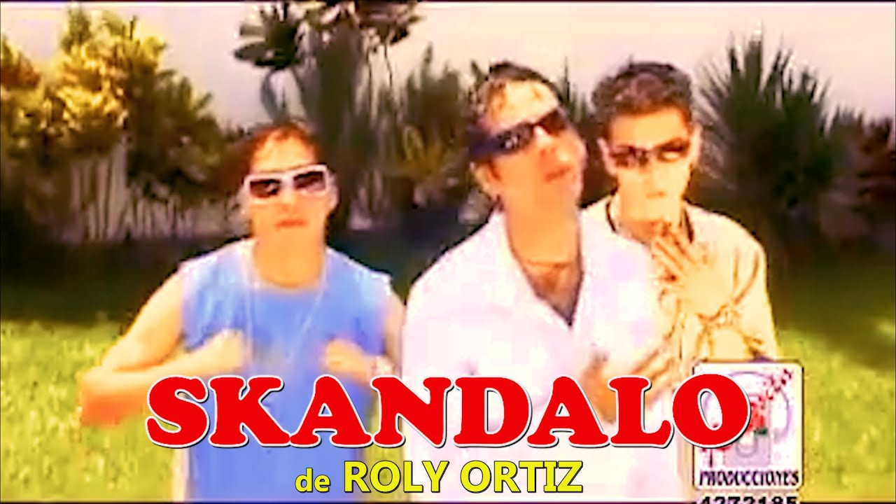 En este mundo - SKANDALO de Roly Ortiz