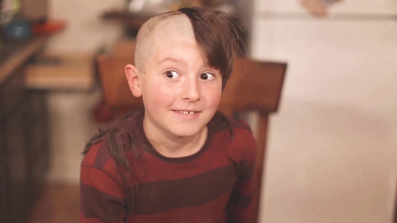 8 year old boy shaves head for friend with Leukemia