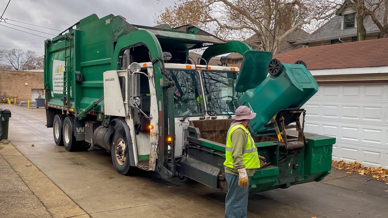 WM McNeilus Front Loader Carry Can Garbage Trucks in Oak Park