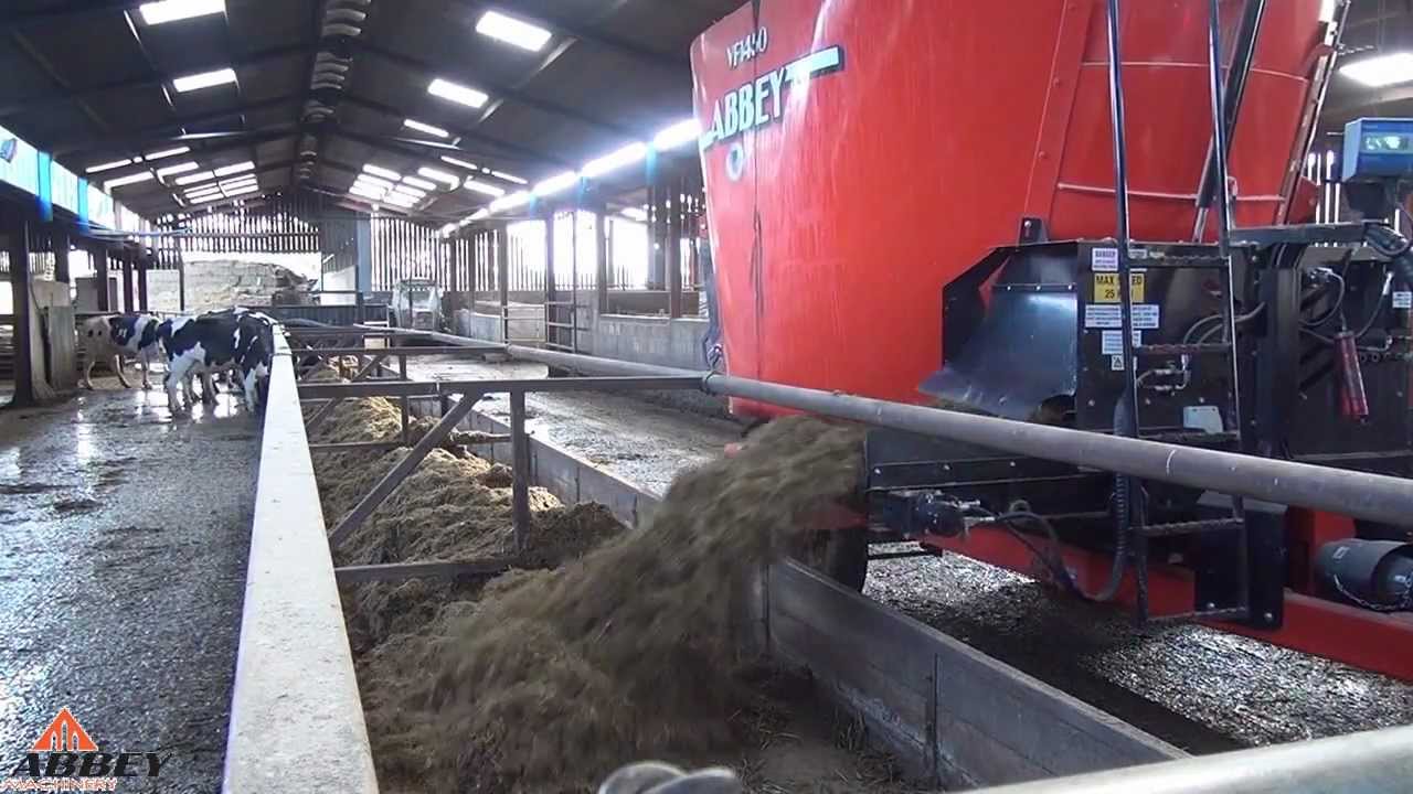 Abbey Machinery Front Cross Elavator PVC Type behind New Holland T6010