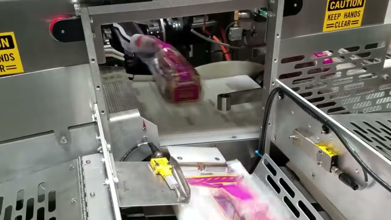 UBE MODEL 75-2 (7600) HIGH SPEED SERVO BREAD BAGGER - BAG CHANGE