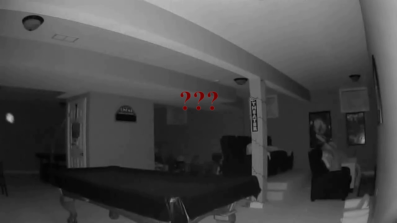 Scary Face and Orbs Caught on Security Camera